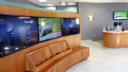 Saturn Digital Media digital signage wall at Libro Financial Group London West3 thumb